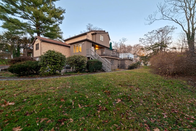 exterior space featuring a yard and a deck