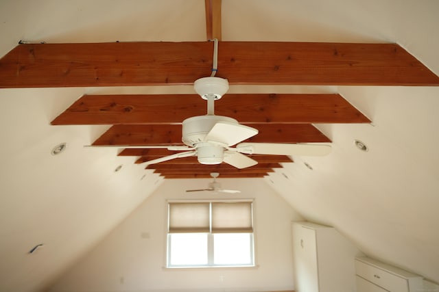 details featuring beamed ceiling and ceiling fan