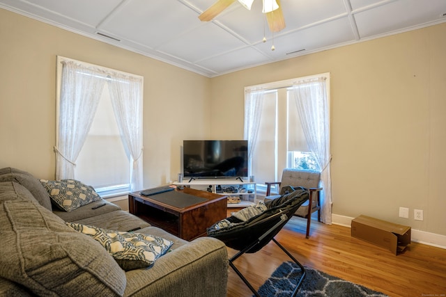 living room featuring ceiling fan and wood-type flooring