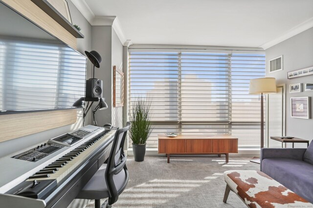 interior space with light carpet and crown molding