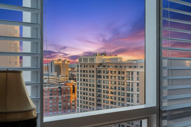 view of balcony at dusk