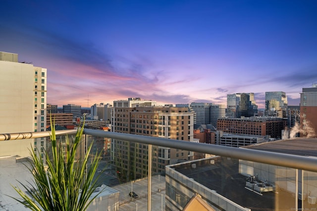 view of balcony at dusk