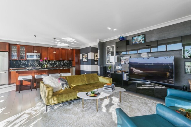 living room featuring ornamental molding