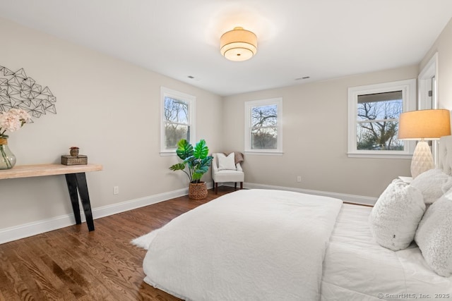 bedroom featuring wood-type flooring