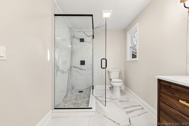 bathroom featuring vanity, toilet, and walk in shower