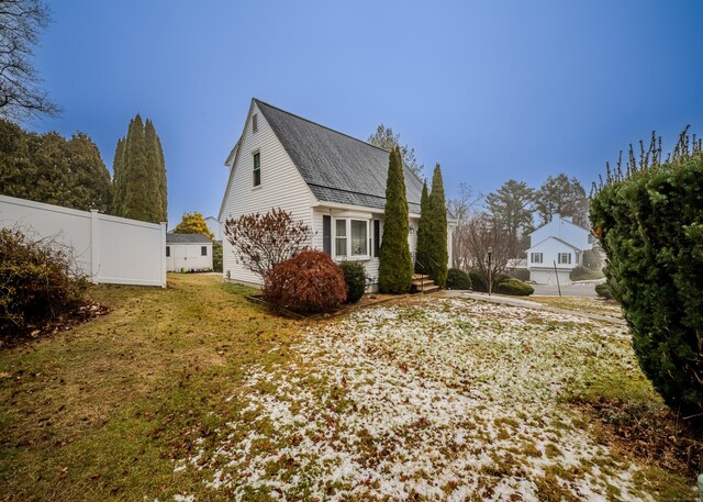 view of home's exterior featuring a lawn