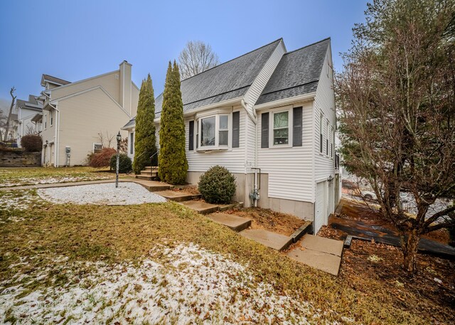 view of home's exterior featuring a garage