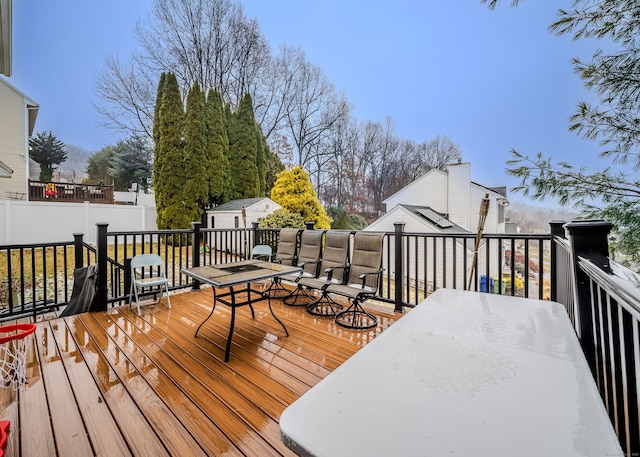 deck with an outdoor structure