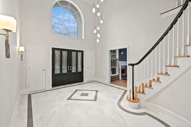 entrance foyer with a towering ceiling