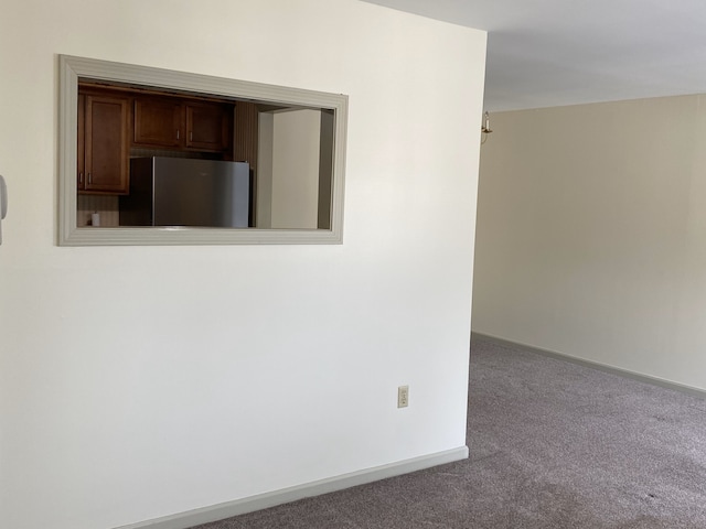 empty room featuring carpet floors