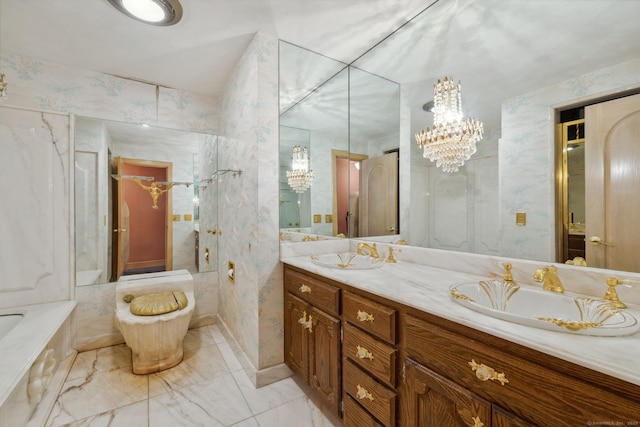 bathroom featuring vanity and a notable chandelier