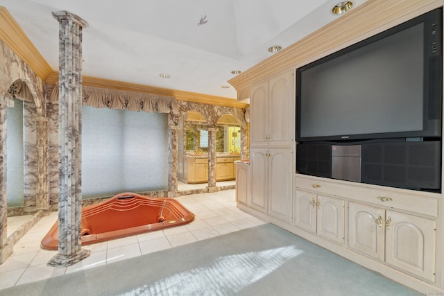 bathroom featuring tile patterned floors, ornamental molding, and ornate columns