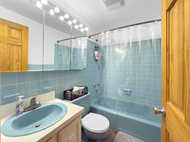 full bathroom featuring tile walls, tasteful backsplash, toilet, shower / bath combo with shower curtain, and vanity