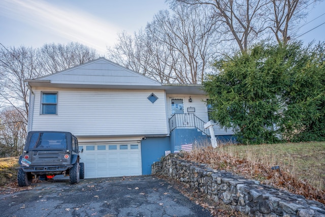 view of front of property featuring a garage