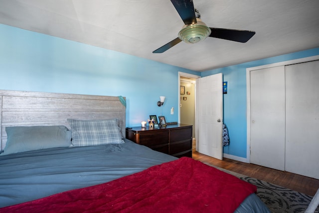 bedroom featuring ceiling fan, wood-type flooring, and a closet