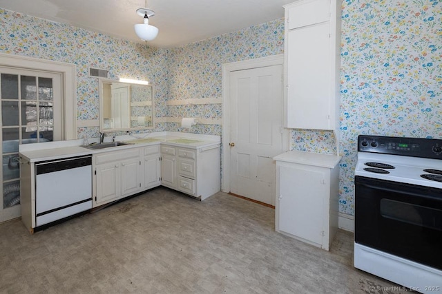 kitchen featuring range with electric stovetop, dishwasher, sink, white cabinets, and light hardwood / wood-style floors