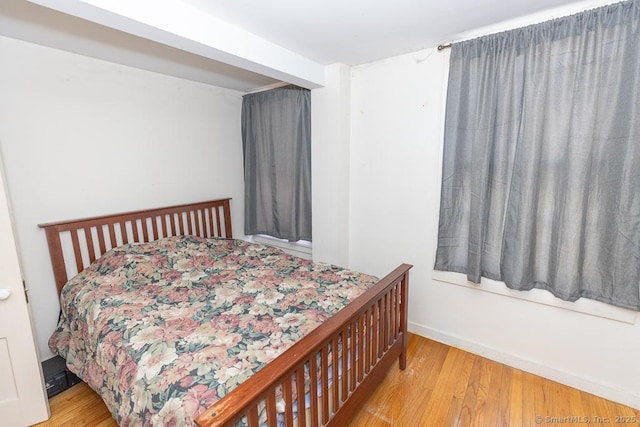 bedroom featuring light hardwood / wood-style flooring