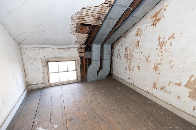 unfurnished room featuring hardwood / wood-style flooring