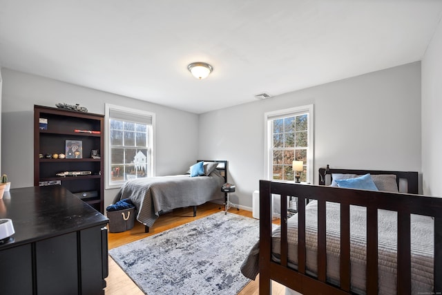 bedroom featuring light hardwood / wood-style floors