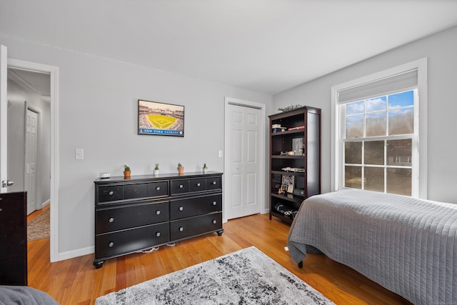 bedroom featuring light wood-type flooring