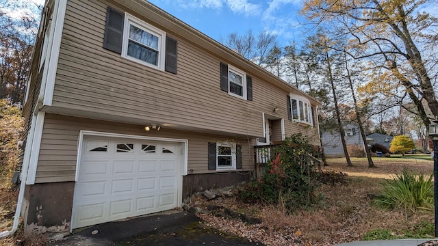 view of home's exterior with a garage