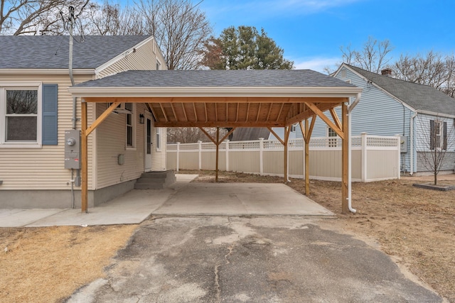 view of car parking with a carport