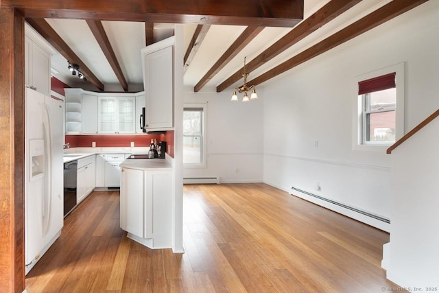 kitchen with white cabinets, decorative light fixtures, baseboard heating, and beamed ceiling