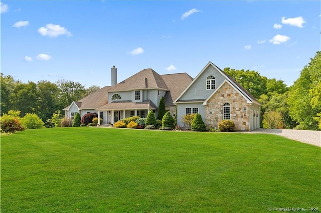 view of front facade with a front lawn