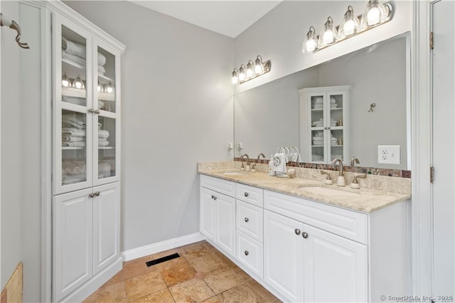 bathroom featuring vanity