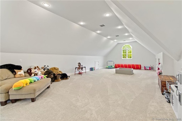 rec room with light carpet and vaulted ceiling