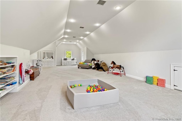 game room with lofted ceiling and light carpet