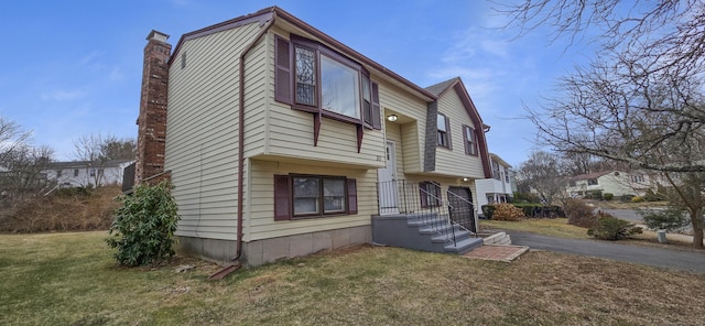 exterior space featuring a front lawn