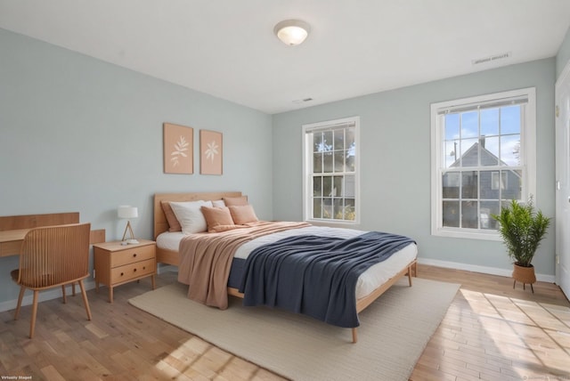 bedroom featuring light hardwood / wood-style flooring