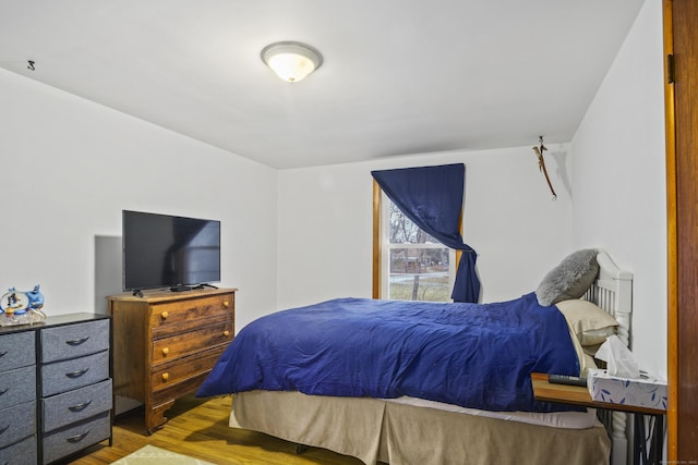 bedroom with light hardwood / wood-style floors