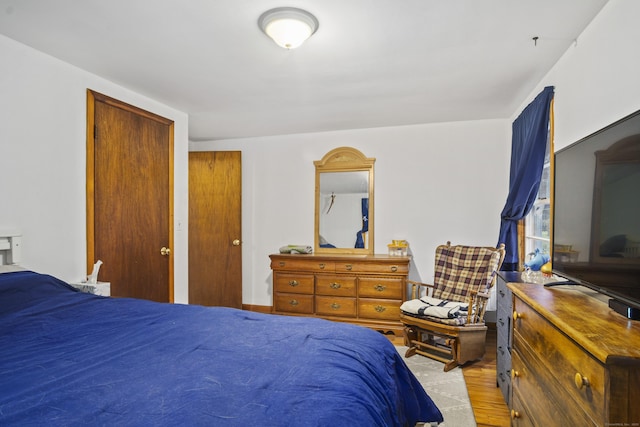 bedroom featuring light wood-type flooring