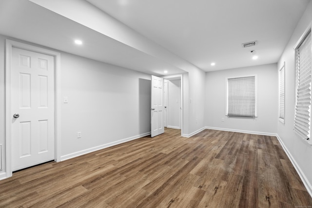 unfurnished bedroom featuring hardwood / wood-style floors