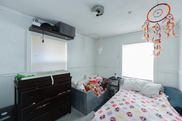 bedroom featuring a textured ceiling