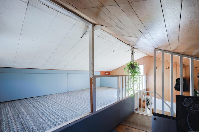 interior space featuring wooden ceiling and lofted ceiling