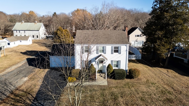 view of front of home with a front lawn