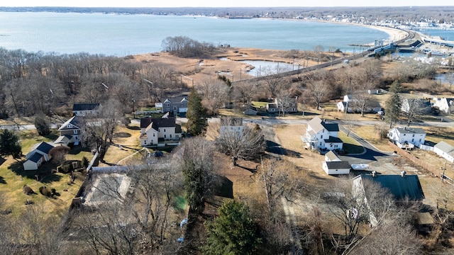 drone / aerial view with a water view