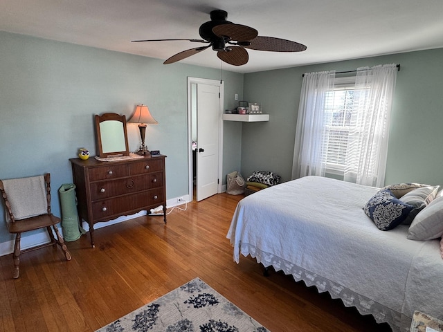 bedroom featuring ceiling fan and light wood-type flooring