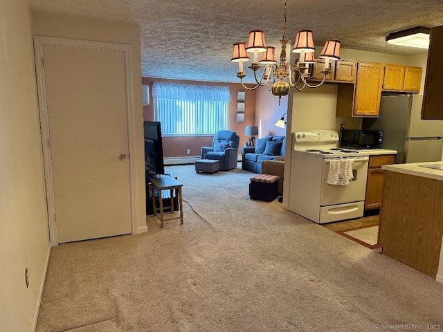 kitchen with a baseboard radiator, pendant lighting, white electric range, stainless steel refrigerator, and light colored carpet