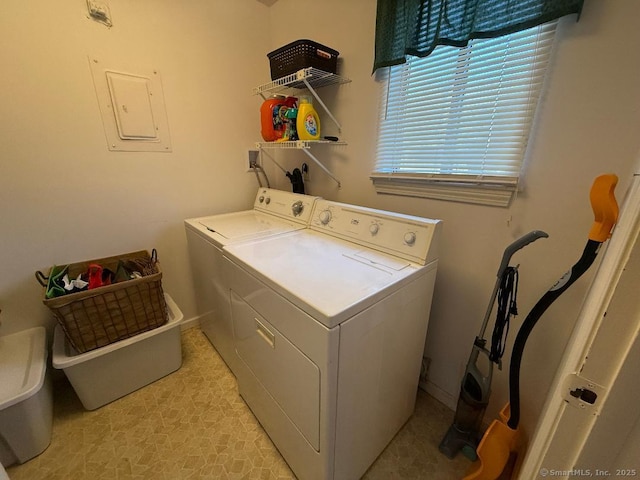 washroom featuring washer and clothes dryer