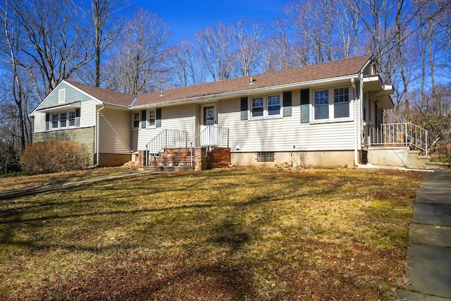 ranch-style home with a front lawn