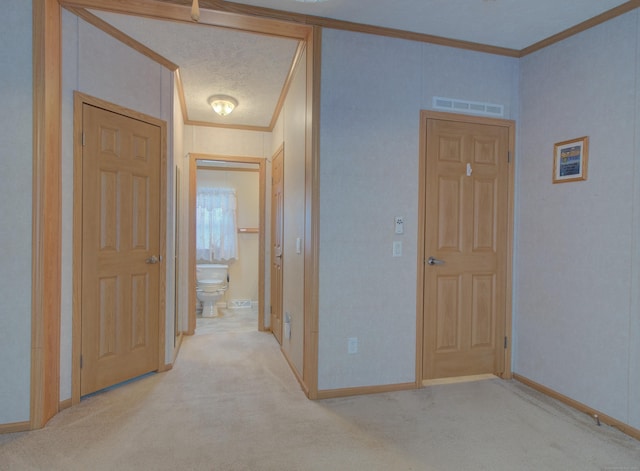 hallway with light carpet and ornamental molding