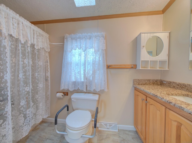 bathroom with curtained shower, a textured ceiling, vanity, toilet, and crown molding