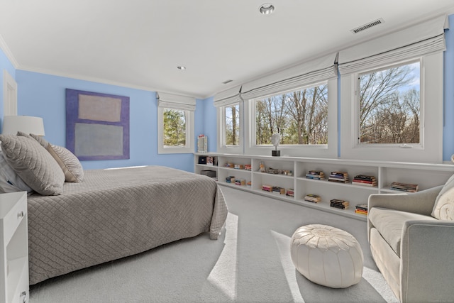 bedroom with carpet and ornamental molding