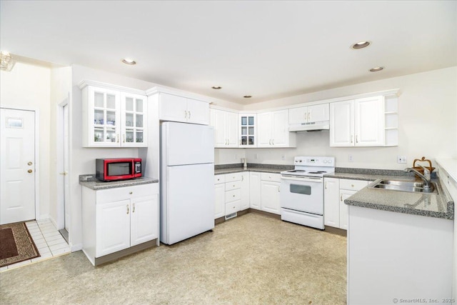 kitchen with white cabinets and white appliances