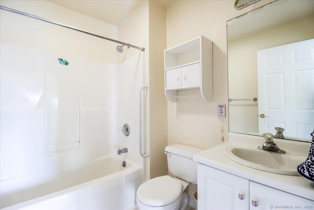 full bathroom with shower / tub combination, vanity, and toilet