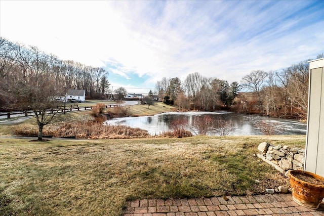 view of yard with a water view